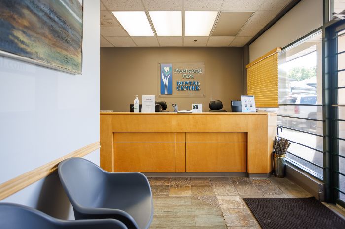 happy couple smiling in park